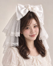 Cherry Blossom Confession white bow and white veil — model view