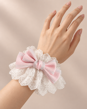 Real hand wearing pink Christmas Bridal Lolita wrist cuff