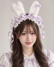 Light purple polka dot plush bunny ear Lolita headband worn by Bowlita model