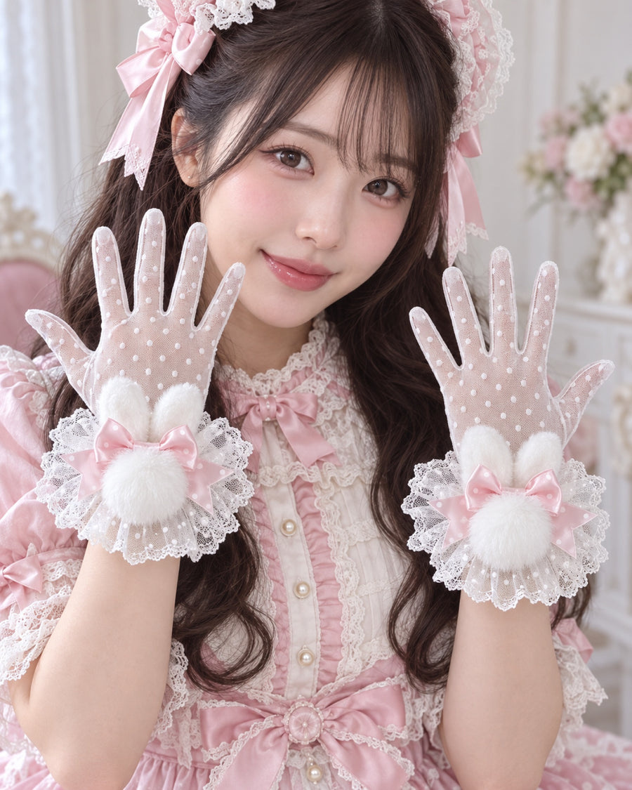 Pink polka dot white bunny ear sleeves with white dotted gloves worn by Bowlita model